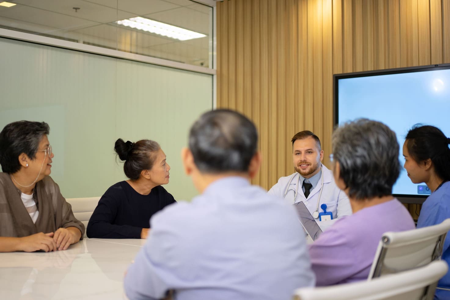 senior people are meeting with doctor
